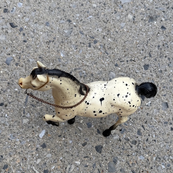 Spotted Black and Cream Horse Figurine